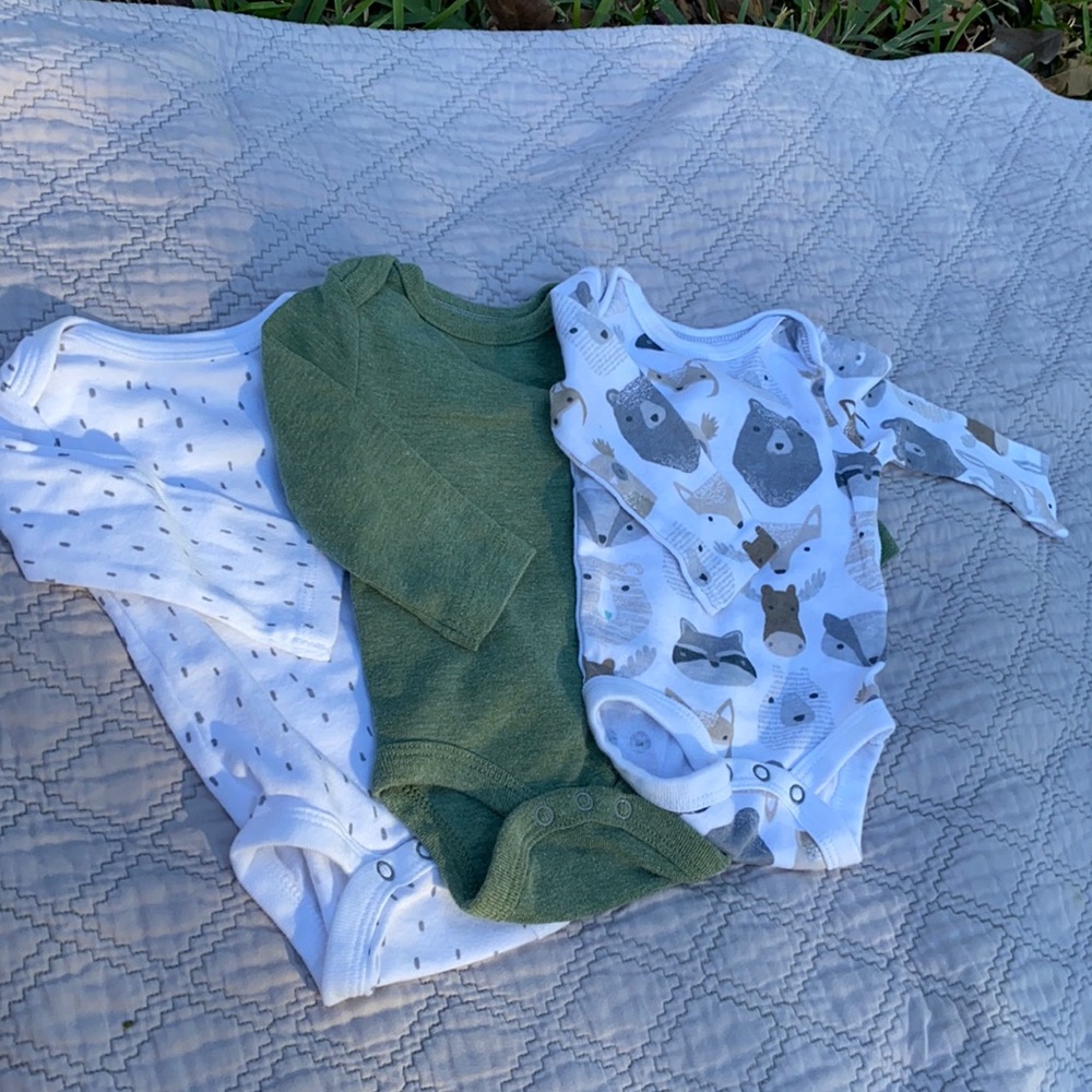 Set of four long sleeved onesies